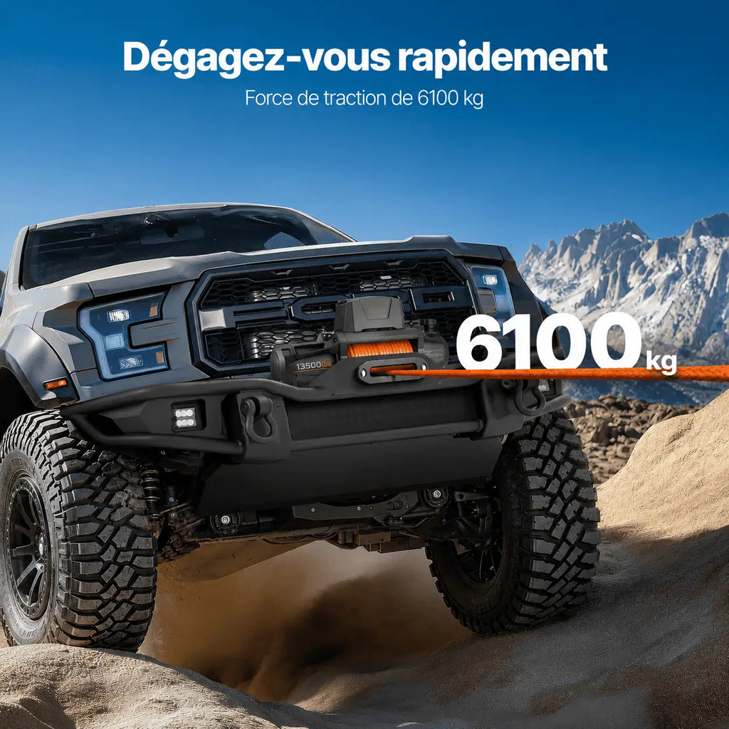 Pick-up tracté hors d'un terrain sableux, force de traction de 6 100 kg indiquée