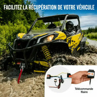 Buggy tracté hors d'un chemin herbeux à l'aide du treuil et de sa télécommande filaire